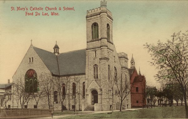 St. Mary's Church, a white stone building and St. Mary's School, a red brick building. Caption reads: "St. Mary's Catholic Church & School, Fond Du Lac, Wisc."