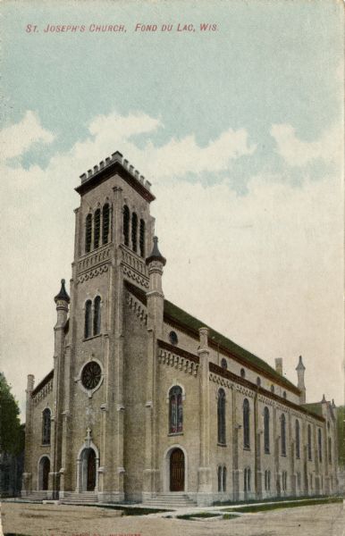 View across street towards the church on a street corner. Caption reads: "St. Joseph's Church, Fond du Lac, Wis." Penciled note on reverse reads: "Burned in big fire 26 Sept 1908. N.E. corner of East and South Streets, built 1873."