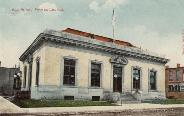 Hand-colored view of the one-story main post office. Caption reads: "Post Office, Fond du Lac, Wis."