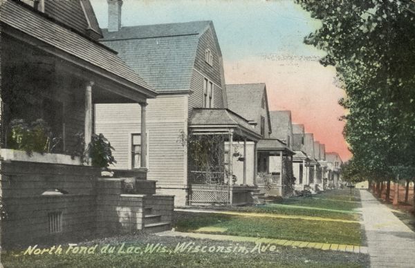 View of a residential street lined with houses. Caption reads: "North Fond du Lac, Wis., Wisconsin Ave."