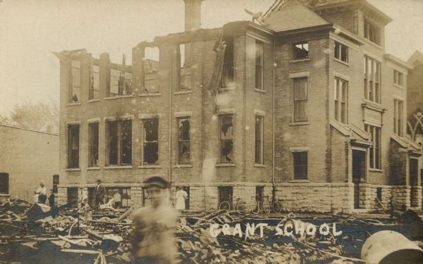 Grant School in the aftermath of Fond du Lac's biggest fire — September 26, 1908. Caption reads: "Grant School."