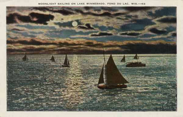 View of sailboats on Lake Winnebago in the moonlight. Caption reads: "Moonlight Sailing on Lake Winnebago, Fond du Lac, Wis."