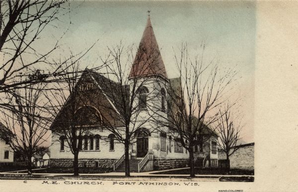 Hand-colored view of the M.E. Church. Caption reads: "M.E. Church, Fort Atkinson, Wis."