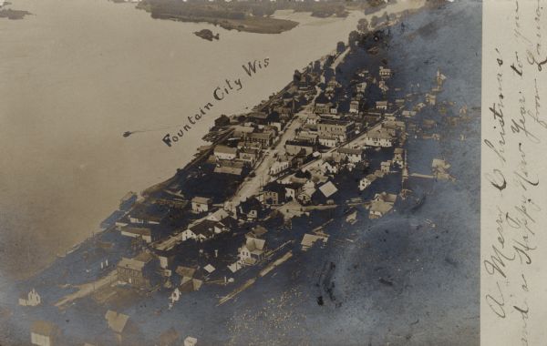 Aerial view of Fountain City and the Mississippi River. Caption reads: "Fountain City, Wis."