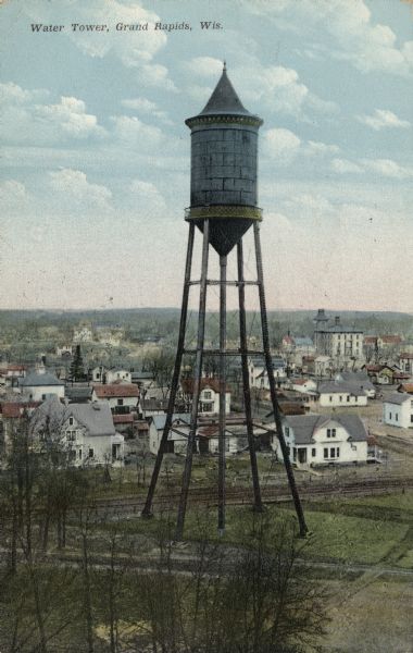 Elevated view of the water tower, with Grand Rapids laid out behind it.