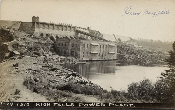 View of a power plant and dam on the Fox River. Caption reads: "High Falls Power Plant."