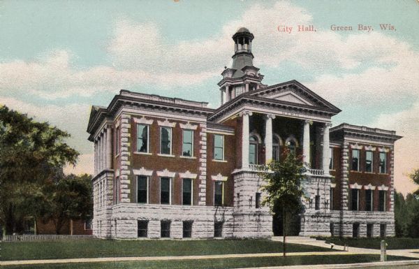 Hand-colored view of the brick and stone city hall. There is an arched entrance, columns on the second floor, and a bell tower. Caption reads: "City Hall, Green Bay, Wis."