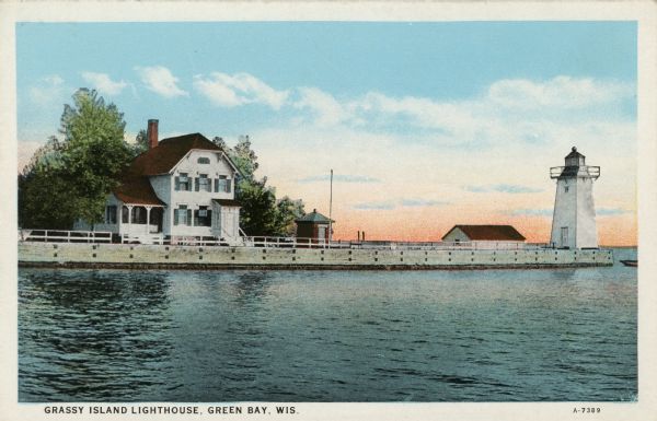 View across water toward the lighthouse. Caption reads: "Grassy Island Lighthouse, Green Bay, Wis."