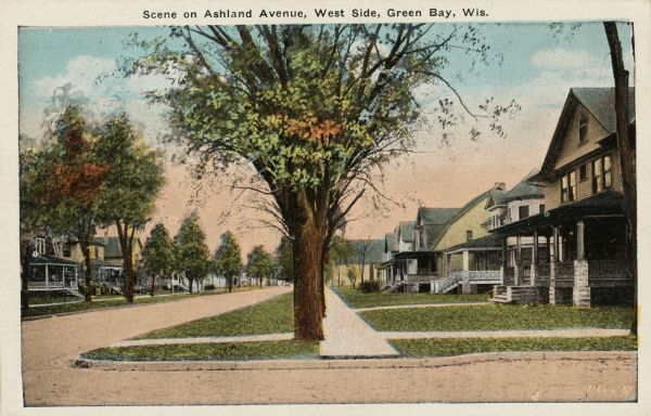 View of a neighborhood street lined with single-family homes. Caption reads: "Scene on Ashland Avenue, West Side, Green Bay, Wis."