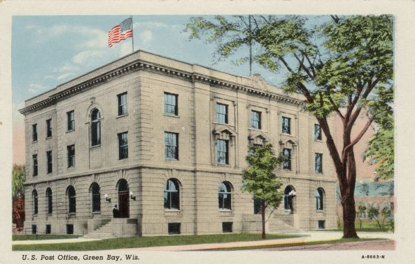Corner view of the main post office in Green Bay. A man is standing at the entrance. Caption reads: "U.S. Post Office, Green Bay, Wis."