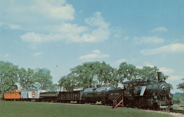Color postcard of the Sumter and Choctaw R.R., Mikado Type Locomotive, freight cars and Milwaukee Road caboose.
