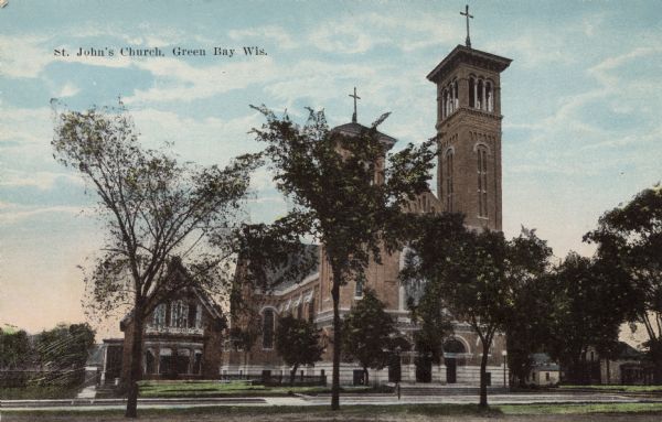 Colorized view of St. John's Church, a cruciform church with two towers. 
Caption reads: "St. John's Church, Green Bay, Wis."