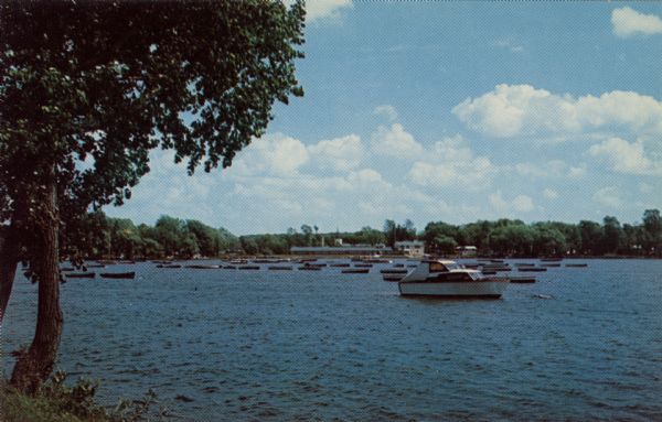 View from shoreline towards a marina in Green Lake.