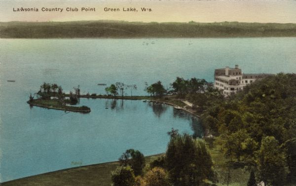 Elevated view of Lawsonia Country Club and strip of land jutting out into Green Lake. Caption reads: "Lawsonia Country Club Point, Green Lake, Wis."