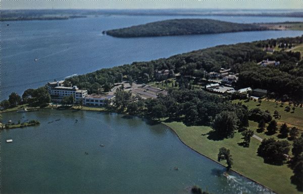 Color postcard of an aerial view of the Roger Williams Inn, Dining Hall, Inspiration Point and General Assembly area for the American Baptist Assembly.