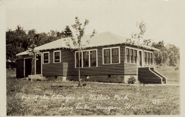 View of a cottage with small trees planted in front. Caption reads: "One of the Cottages at Miller's Park, Long Lake, Haugen, Wis."