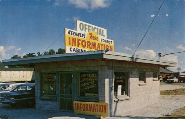 Exterior view of a small information center.

Text on reverse reads: "Keehner's Information Center
Specialists in locating you 'A Vacation Spot Sure To Please'
We have inspected all resorts Connie and Jack Keehner"