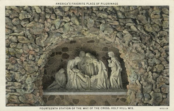 Colorized view of the 14th Station — Christ being laid in his tomb. The sculpture is in a niche in a stone arch. Caption at top reads: "America's Favorite Place of Pilgrimage."Caption at bottom reads: "Fourteenth Station of the Way of the Cross, Holy Hill, Wis."