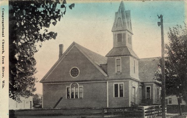 Exterior view of a wooden church with a bell tower. Caption reads: "Congregational Church, Iron River, Wis."