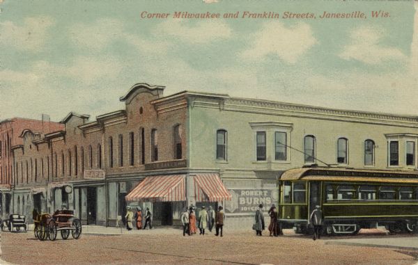 Illustration of a street corner in downtown Janesville. A horse-drawn buggy, a streetcar and pedestrians are in the street. Caption reads: "Corner Milwaukee and Franklin Streets, Janesville, Wis."