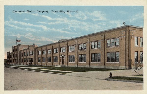 Colorized postcard view of the Chevrolet Motor Company headquarters and auto plant. Caption reads: "Chevrolet Motor Company, Janesville, Wis."