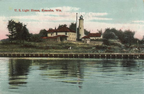Illustration of view across water towards a lighthouse and surrounding buildings. Caption reads: "U.S. Light House, Kenosha, Wis."