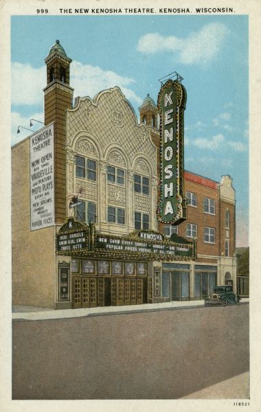 Illustration of the New Kenosha Theatre. The marquee is advertising "Swim, Girl, Swim" with Bebe Daniels. An advertisement is painted on the left side of the building. Caption reads: "The New Kenosha Theatre, Kenosha, Wis."