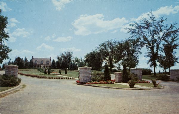 View of the entrance drive to the Petrifying Springs Clubhouse.