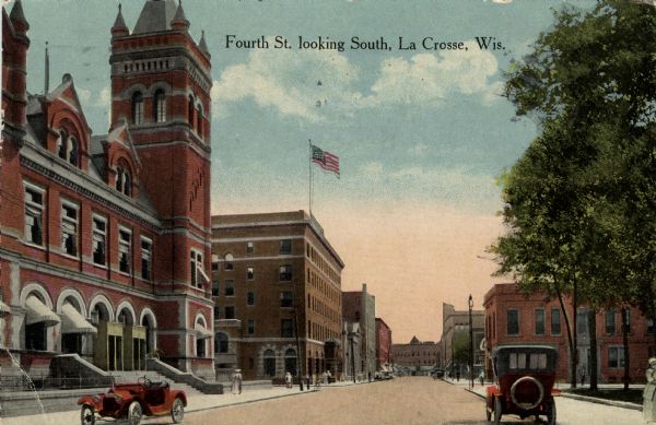 View down street towards the central business district, with the city hall in the left foreground. Automobiles are parked along the curbs. Caption reads: "Fourth St., Looking South, La Crosse, Wis."