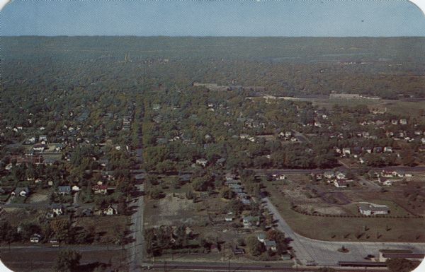 Text on reverse reads: "Bird's-eye view of La Crosse, Wis., from Grandad Bluff. This thriving manufacturing, wholesale and retail city is an awe inspiring sight when seen from Grandad bluff towering 600 feet above the city."