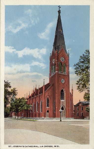Hand-colored view of St. Joseph's Cathedral with Gothic windows. There are clocks on the steeple. Caption reads: "St. Joseph's Cathedral, La Crosse, Wis."