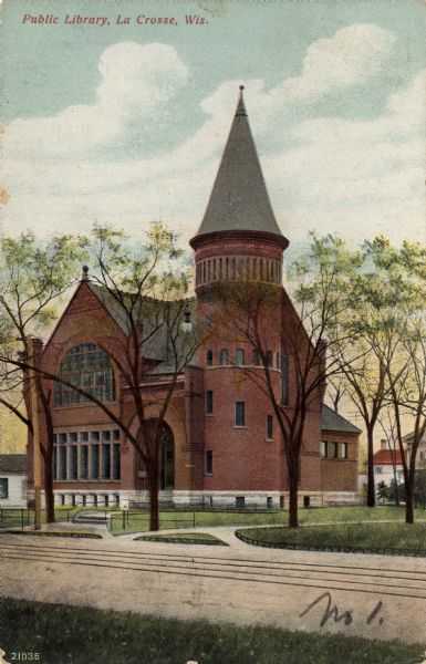 The public library with a turret and Romanesque arches over the entrance and front window. Caption reads: "Public Library, La Crosse, Wis."