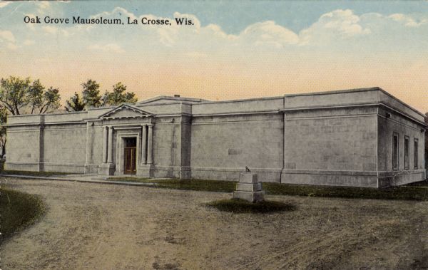 Hand-colored view of the facade of the mausoleum in Oak Grove Cemetery. Caption reads: "Oak Grove Mausoleum, La Crosse, Wis."