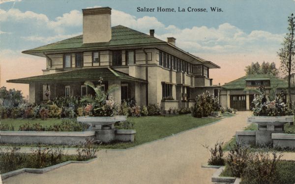 View of the Henry Salzer home, located at the corner of Cass and King Street. It was built in the Prairie School style of architecture. Caption reads: "Salzer Home, La Crosse, Wis."