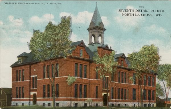 View of a large, brick two-story school with a bell tower. Caption reads: "Seventh District School, North La Crosse, Wis."