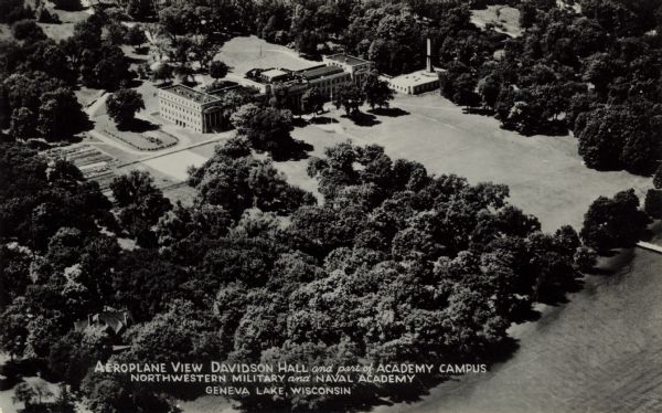 Aerial view of the campus of the Northwestern Military and Naval Academy. Caption reads: "Aeroplane View Davidson Hall and part of Academy Campus, Northwestern Military and Naval Academy, Geneva Lake, Wis."