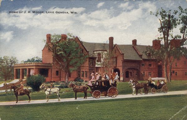 View of a large, red brick house. People on horseback and horse-drawn carriages are lined up on the driveway in front. Caption reads: "Home of J. H. Moore, Lake Geneva, Wis."