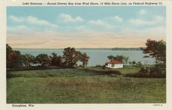 View down hill towards the west shore of Lake Kegonsa. A small white house is next to the lake. Caption on front reads: "Lake Kegonsa — Across Dewey Bay from West Shore, 15 Mile Shore Line, on Federal Highway, 51, Stoughton, Wis."