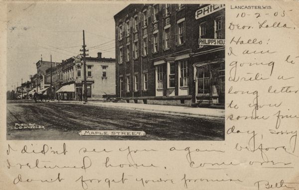 View across Maple Street towards the Philipps House Hotel. A bank is on the next corner. Caption reads: "Maple Street."