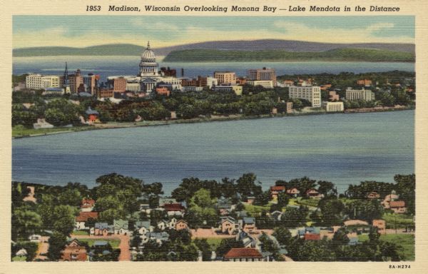 Illustrated postcard of an elevated view of Monona Bay, the Isthmus and Lake Mendota. A residential neighborhood is in the foreground. Caption reads: "Madison, Wisconsin Overlooking Monona Bay &#8212; Lake Mendota in the Distance, Madison, Wis."