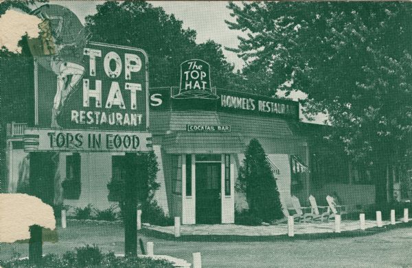 Exterior view of the restaurant, with electric signs in the parking lot and above the entrance. Text on reverse reads: "For delightful dining... come to Hommel's Top Hat Restaurant, nestled among the maple trees, 6 miles west of Madison on Highways 12, 13, and 14, near the shore of Lake Mendota.