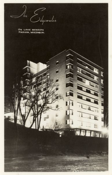 Night view of the original Edgewater Hotel located on the corner of Langdon Street and Wisconsin Avenue on the south shore of Lake Mendota. Caption reads: "The Edgewater On Lake Mendota, Madison, Wisconsin."