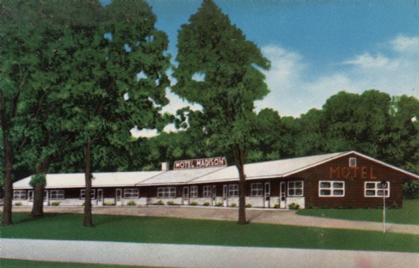 View of the motel surrounded by trees. Located at the junction of 12 & 18 on U.S. 51.