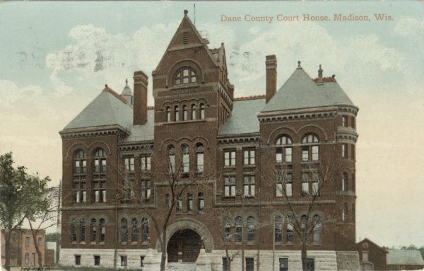 Exterior view of the Dane County Courthouse, 207 W. Main Street. Caption Reads: "Dane County Court House, Madison, Wis."