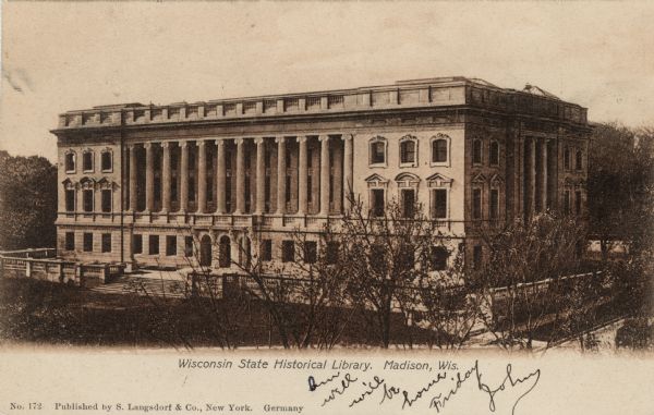 Elevated view of the State Historical Library, with a grassy lawn in front of the main entrance. Caption reads: "Wisconsin State Historical Library, Madison, Wis."