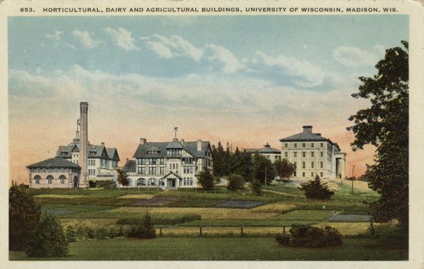 View of the Horticultural, Dairy and Agricultural Buildings. Plots of land set aside for crops are in the foreground. Caption reads: "Horticultural, Dairy and Agricultural Buildings, University of Wisconsin, Madison, Wis."