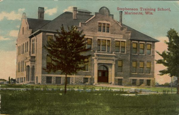 Exterior view of the school. Caption reads: "Stephenson Training School, Marinette, Wis."