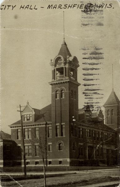 Exterior view of City Hall and clock tower. Caption reads: "City Hall, Marshfield, Wis., Wis."