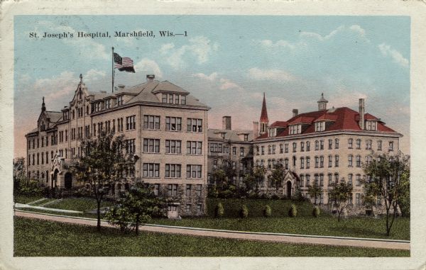 Exterior view of St. Joseph's Hospital. Caption reads: "St. Joseph's Hospital, Marshfield, Wis."