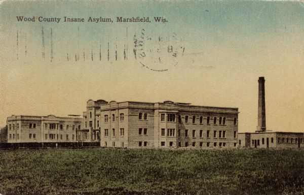 Exterior view of the Wood County Insane Asylum. Caption reads: "Wood County Insane Asylum, Marshfield, Wis."